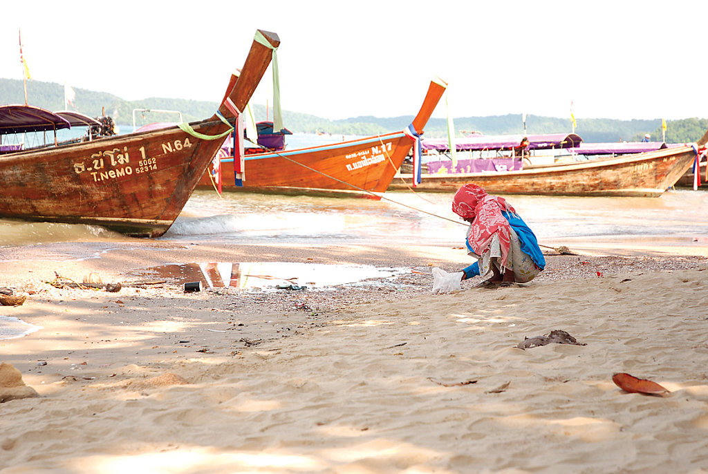 woman collecting shells